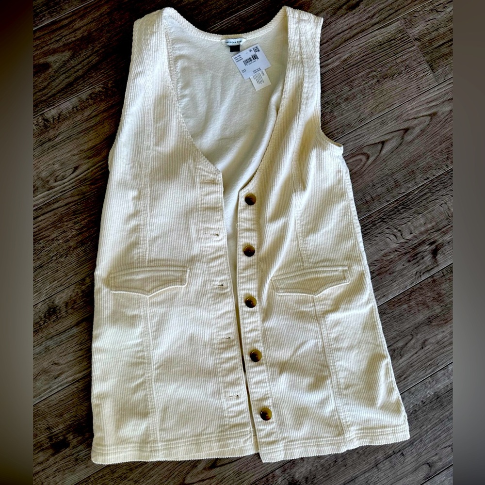 super cute cream dress. fabric and material is great for both winter and summer
